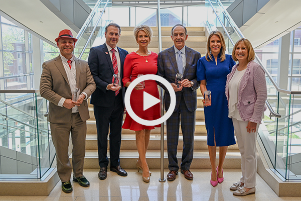 The advisory board awards recipients posing for a photo with Dean Kathy Farrell.